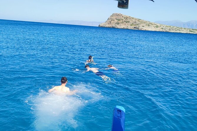 4 Hour Fishing and Swimming Boat Experience in Schisma Eloundas - Fishing on the water: rods, bait, and a real shot at a meal
