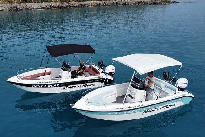 4-Hour Private Boat Rental Without Skipper at Agios Nikolaos - Agioi Pantes: goats, a white-sand shoreline, and a church at the top