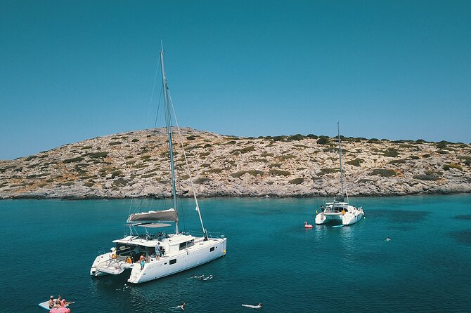 Ag. Nikolaos: Catamaran Trip with Sushi, Drinks, & Water Toys - Spinalonga Island views: the scenic warm-up before the water toys