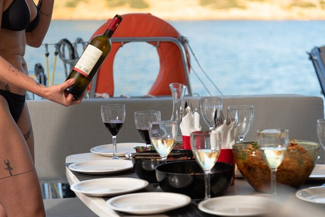 Ag. Nikolaos: Catamaran Trip with Sushi, Drinks, & Water Toys - Catamaran comfort on board: shaded lounges, water slide, and real downtime