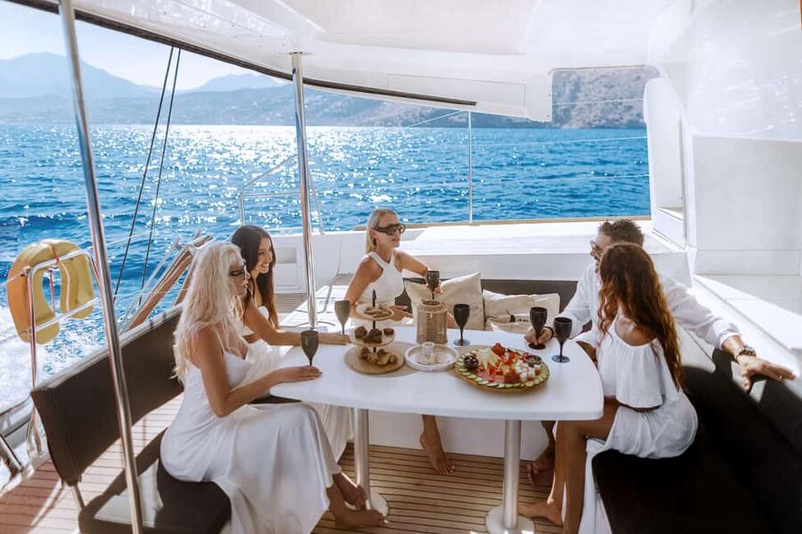 Agios Nikolaos All-inclusive Catamaran Cruise & Water Toys - Welcome drinks and the breakfast-to-lunch food flow