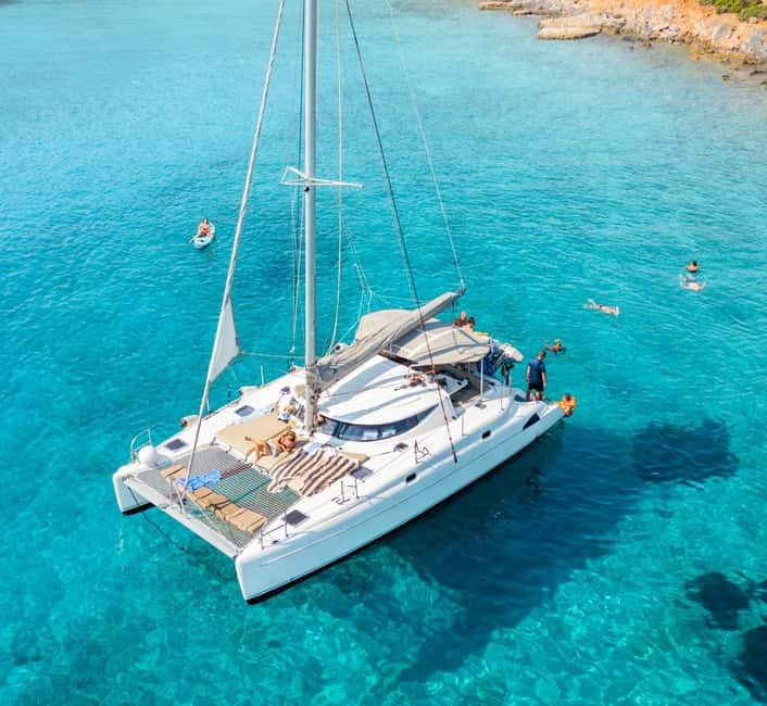 Agios Nikolaos: Spinalonga and Kolokytha Catamaran with Meal - Mirabello Gulf sailing: the color show happens before the swim