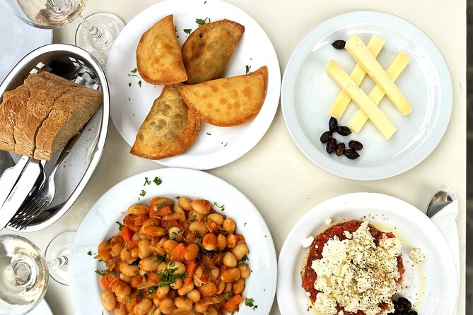 Chania: Evening Feasts A Journey through Cretan Flavors Food Tour - Kostas and the Flavor Story Behind Each Stop