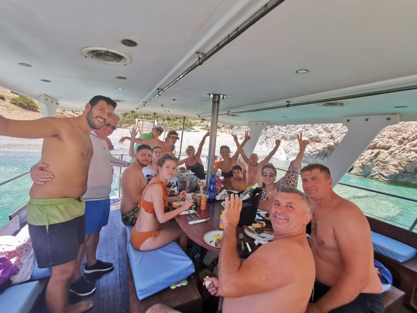 Chania: Menies Beach & Chironisia Bay Cruise with Snorkeling - Menies Beach: ancient Diktynna above, WWII snorkeling below
