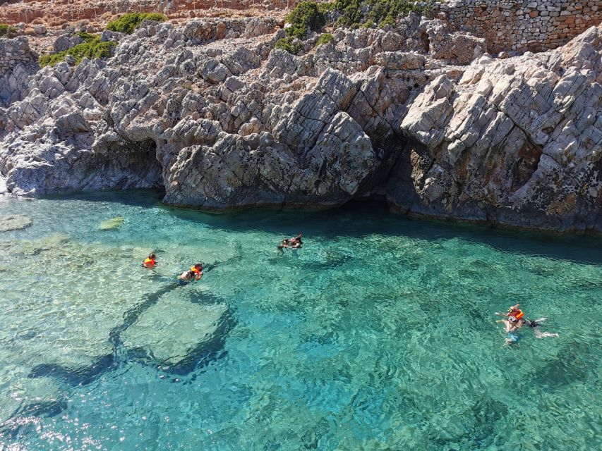 Chania: Menies Beach & Chironisia Bay Cruise with Snorkeling - Chironisia Bay: the sea-only stop and the cave-scanner mindset