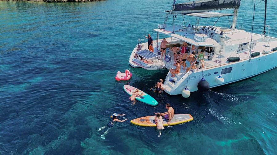 Chania Old Port: All-inclusive Catamaran Trip Agioi Theodori - The catamaran itself: modern comfort with shade where you need it