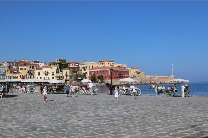 Chania old town and around private tour (price per group of 6) - Old Venetian Harbor and the lighthouse pier: the view that earns the effort