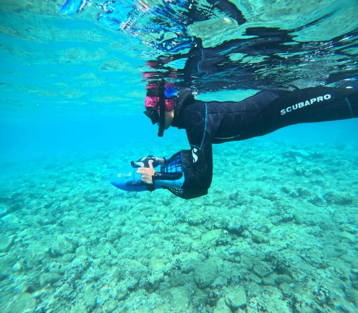 Chania: Sea Scooter Snorkeling boat tour - The boat cruise on Souda Bay: snacks onboard, limited group energy, and water entry