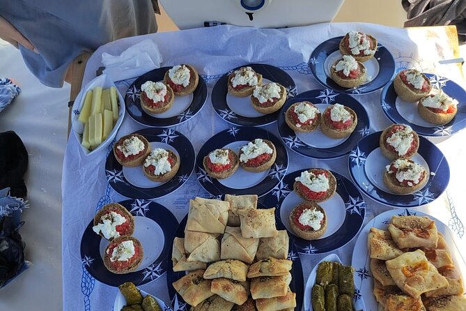 Chania shared Sailing cruise in a small group - What’s Included: Snacks, Drinks, and Snorkel Gear