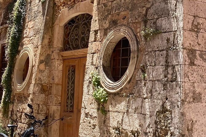 Chania Walking Food And Wine Night Tour - Stop 6: the Cretan feast ending with raki, beer, dessert, and wine