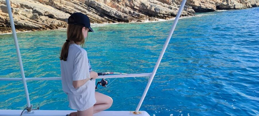 Crete: Fishing & Swimming Boat Cruise with Lunch & Drinks - Lunch on Board: Fresh-Caught Fish, Greek Salad, and Drinks