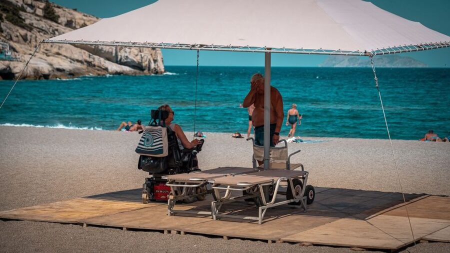 Crete: Matala Beach and Hippie caves, Red beach - Matala village streets: murals, small shops, and where to eat