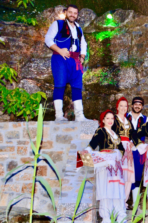 Crete: Traditional Cretan Night: Live Show and Dinner - The taverna welcome: raki, wine, and getting settled