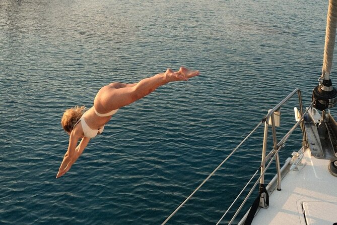 Daily cruises to Dia Island with All -Inclusive Meal and drinks - Dia Island time: snorkeling, SUP, and protected-cove swimming