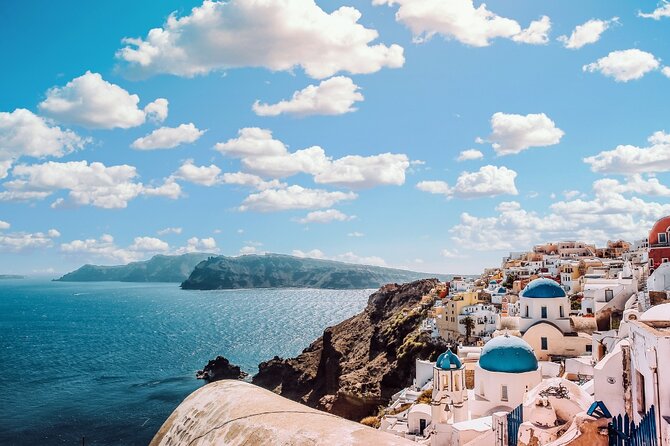 Day Tour to Santorini Island from Heraklion Crete - Oia First: Blue Domes, Narrow Lanes, and Crowd Reality