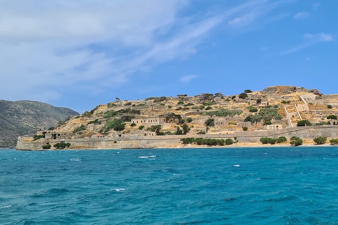 Day Trip to Agios Nikolaos and Spinalonga Island - Spinalonga Fortress island: leprosy colony history, ticket reality, and how to enjoy it