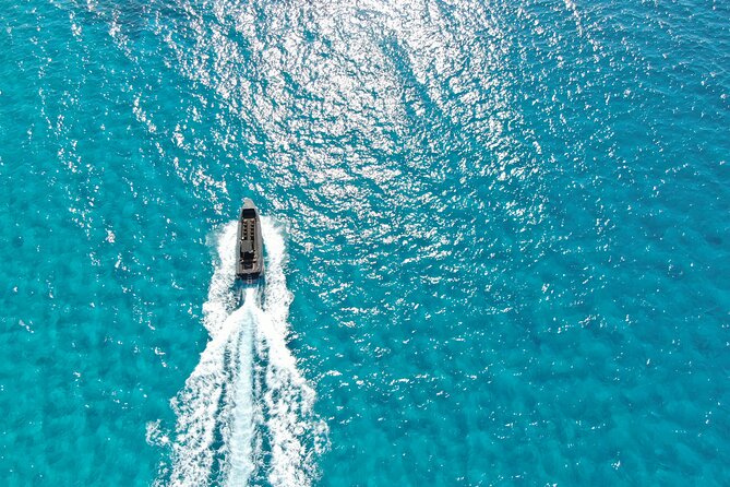 Falassarna to Balos Lagoon and Gramvousa Group Cruise - Drinks, seating, and swim reality on a speedboat day