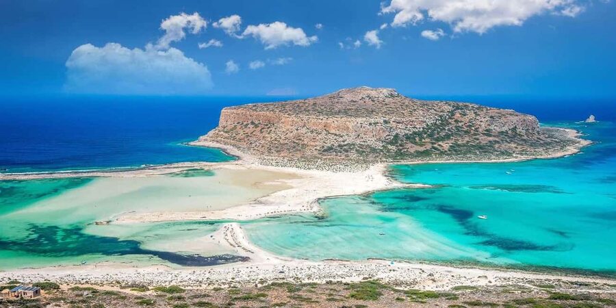 From Chania/Kissamos: Balos Lagoon Off-Road Trip & Panoramic View With a Hike - Balos beach time: swim, shell sand, and the wind reality