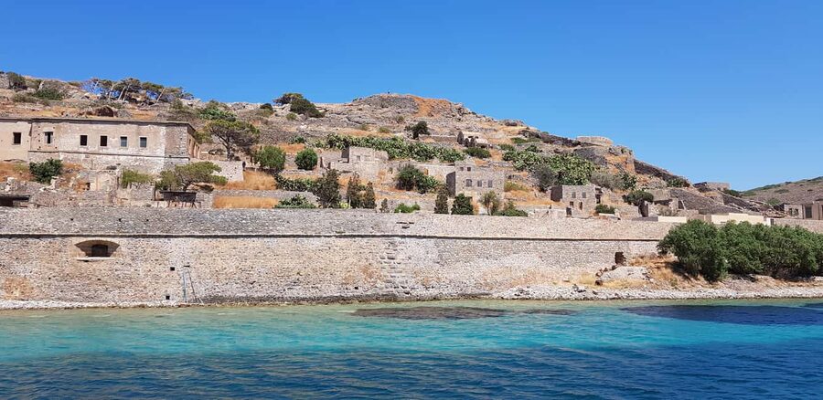 From Heraklion:Spinalonga ,Elounda & Ag. Nikolaos with Lunch - Agios Nikolaos and Lake Voulismeni: the stroll that feels like a reward