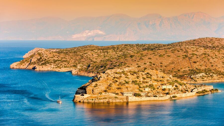 From Heraklion: Spinalonga Guided Tour, Agios Nikolaos & BBQ - Agios Nikolaos free time: Lake Voulismeni and a slow stroll reset