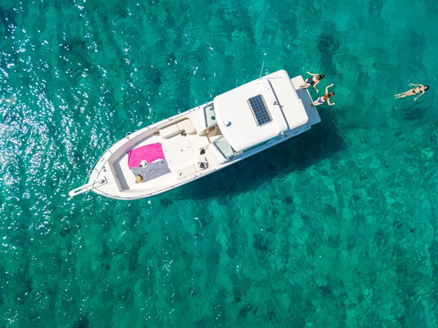 From Kissamos Port: Private Boat Cruise to Balos & Gramvousa - Onboard comfort: wine, water, and Cretan salad with fruit