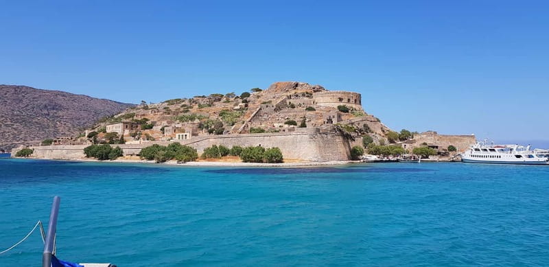 Heraklion Areas : Elounda Boat Trip -The Authentic - Onboard vibes: music, dancing, and guides like Nektaria or Marissia