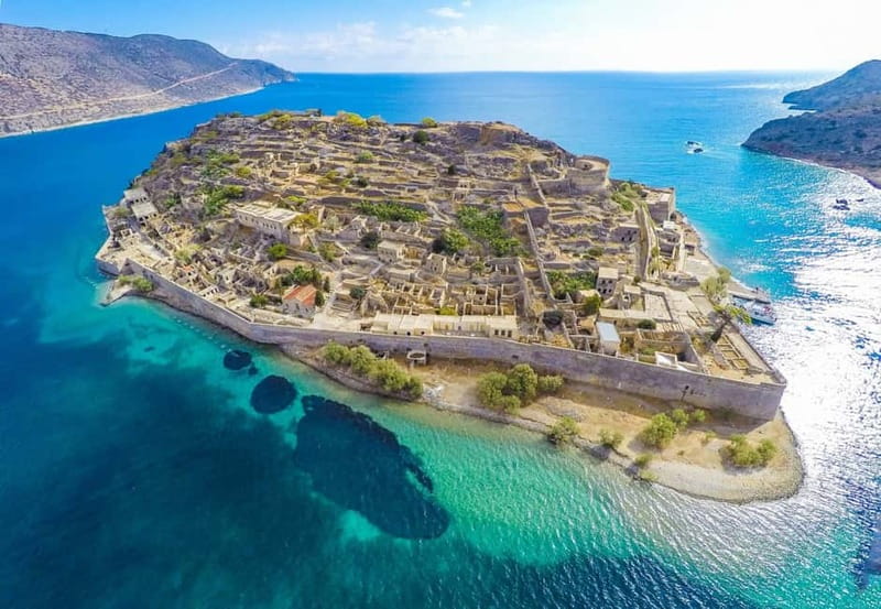 Heraklion: Spinalonga, Agios Nikolaos, & Elounda Tour - The boat ride across Mirabello Bay: short transit, strong scenery