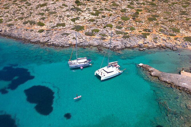 Heraklion: Sunset Luxury Cruise with Sushi and Open Bar - Dia Island bay: swimming time, SUP, snorkel gear, and the flamingo moment