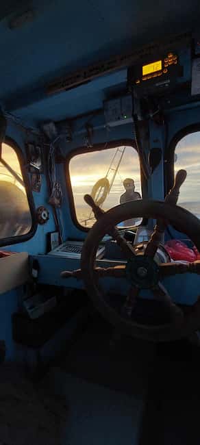 Hersonissos: Agapi Fishing Trips Sunset Cruise - Your 1.5-hour window: rod fishing, swimming, and crew help