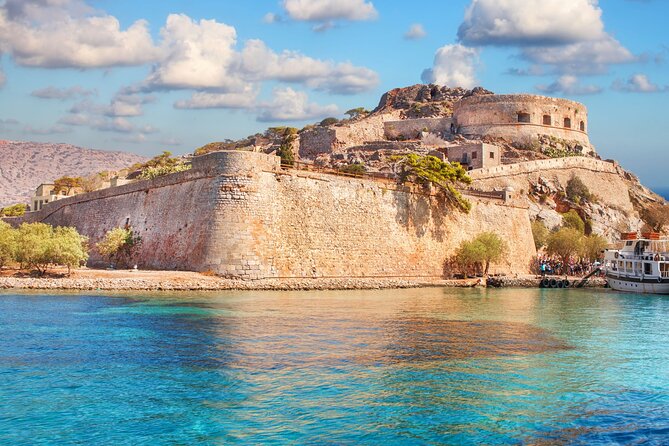 Island of Spinaloga Full-Day Tour from Heraklion with Lunch - Spinalonga by boat: why that ride is part of the experience