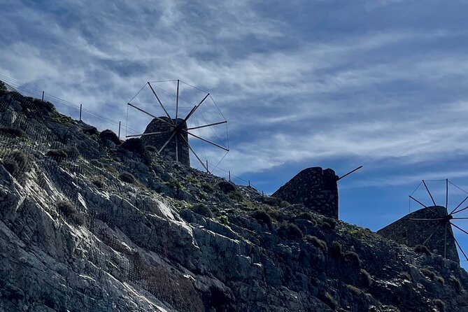 Knossos Cave of Zeus and Olive Oil Factory Full Day Private Tour - Windmills of Lasithi Plateau and a traditional tavern lunch window