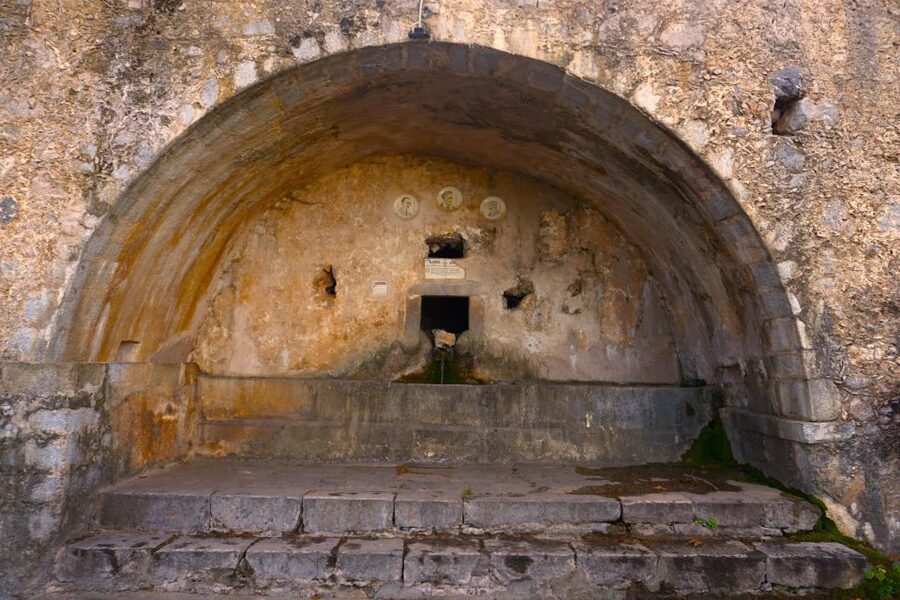 Lasithi Plateau & Zeus Cave: Myths and Villages Tour - Krasi village: plane tree legend, village snacks, and real tavern lunch