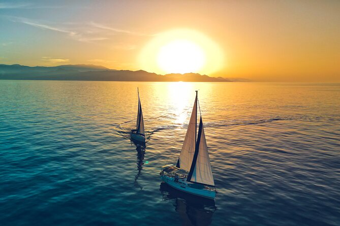 Private Sailing Cruise to Dia Island with Meal & Water Activities - Your water menu: swim stop, snorkeling gear, fishing gear, and SUP time