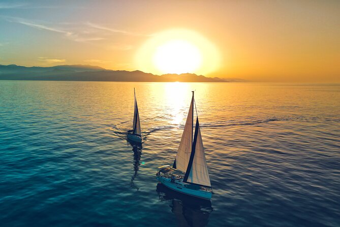 Sailing Cruise to Dia Island with Meal and Water Activities - Snorkeling, SUP, fishing gear, and the best way to use what’s included