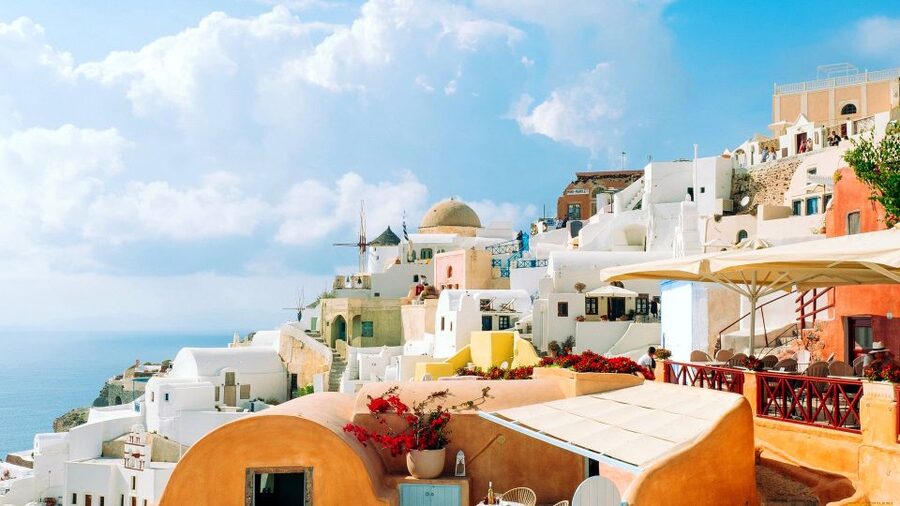 Santorini Guided Day Trip From Crete with Ferry Tickets - Optional volcano boat and warm-springs style water
