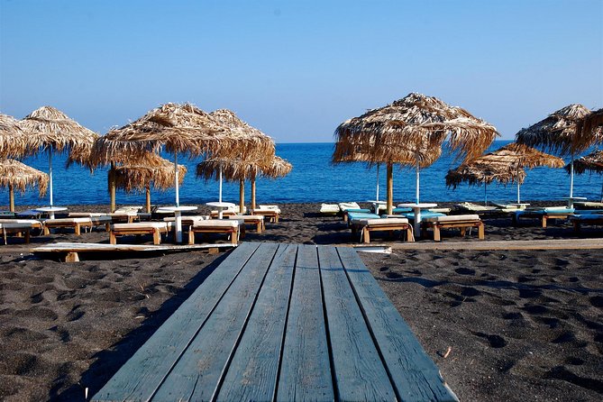 Santorini Island: Guided Tour From Heraklion Crete - Fira and the Three Bells walk: churches, museums, and big views