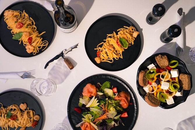 Semi-private Sailing trip with Lunch and Water Toys - Lunch at Sea: Mediterranean Food and Real Break Time