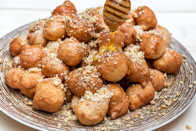 Walking Food Tasting Tour in Chania Town - Stop-by-stop in spirit: what each part is doing for you