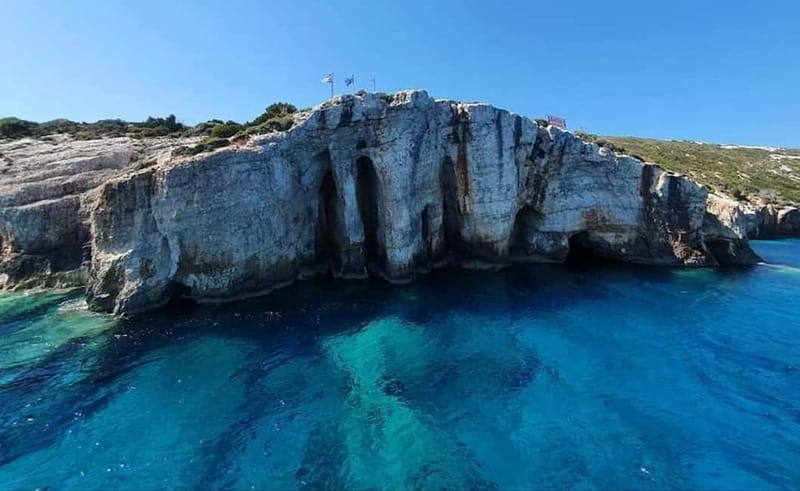 Zakynthos: Blue Caves and Navagio Bay Swim Cruise - First leg to Agios Andreas Bay: swims, photos, and monastery ruins